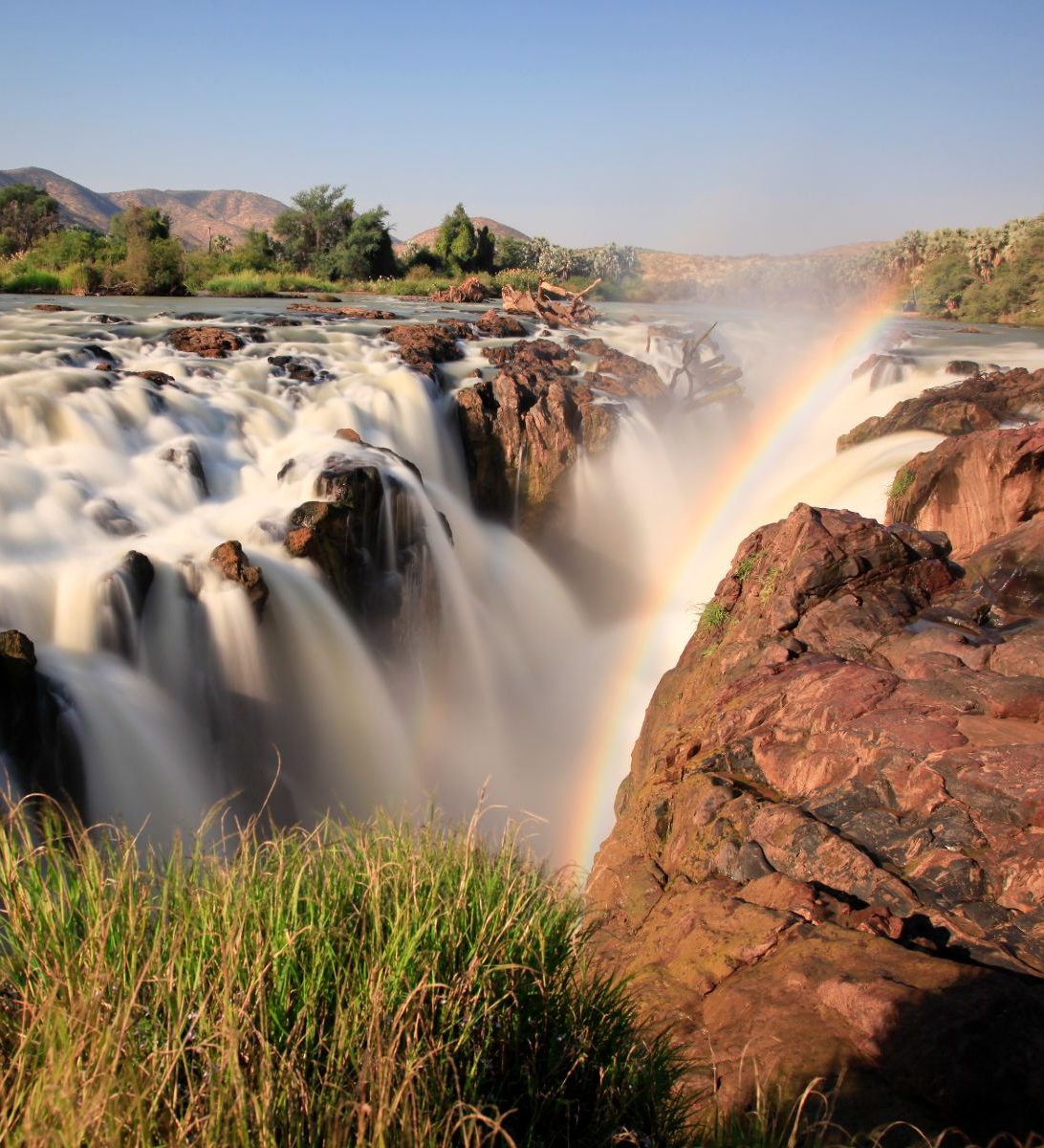Rondreis-Namibie-Epupa-Falls-waterval-met-regenboog Rondreis Namibië, Epupa Falls, waterval met regenboog