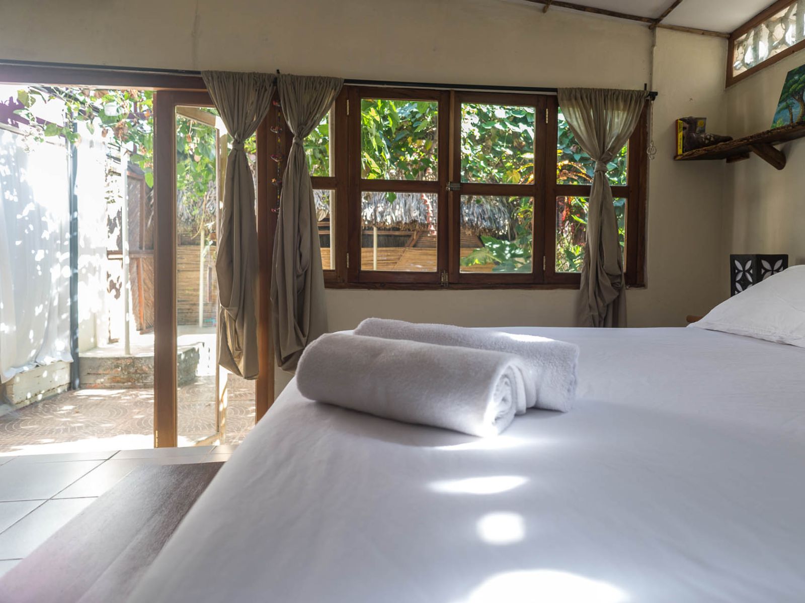 rondreis nicaragua, apoyo lagune, casa marimba bed